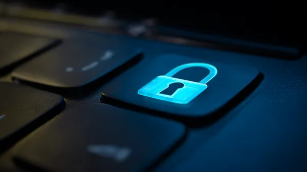 Một chiếc laptop hiển thị màn hình đăng nhập nổi bật trong không gian tối giản, tượng trưng cho hệ thống truy cập bảo mật của F8BEF.